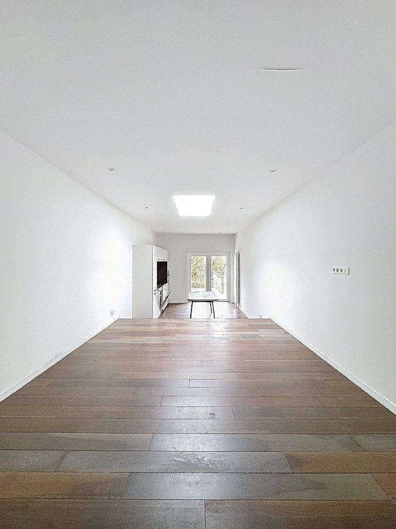 Elegant wonen in Tienen: gerenoveerde rijwoning met 3 slaapkamers en zuidwestgerichte tuin. foto 6