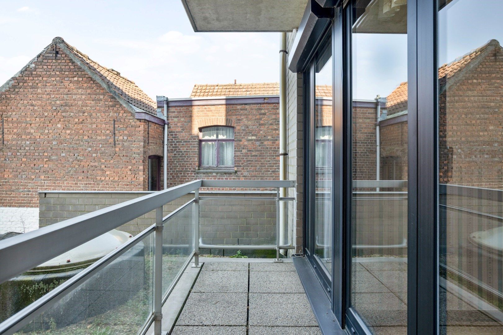Mooi 2-slaapkamerappartement in hartje Menen! foto 17