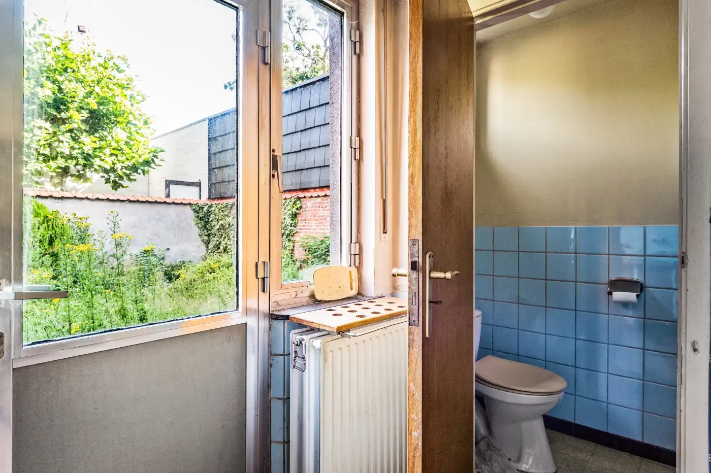 Te renoveren woning met 3 à 4 slpk., garage en tuintje foto 18