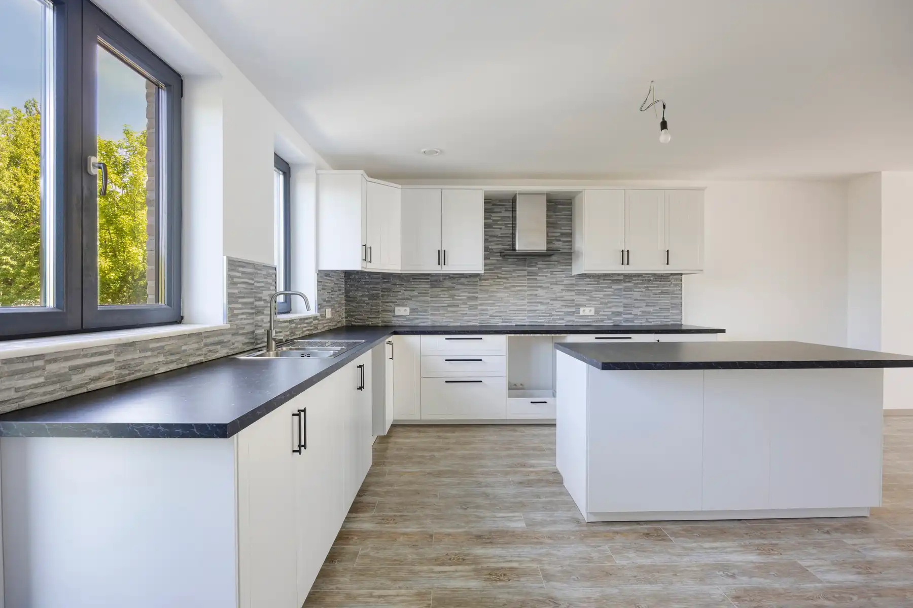 Nieuwbouw triplex met 4 slaap- en badkamers, tuin en parking foto 7