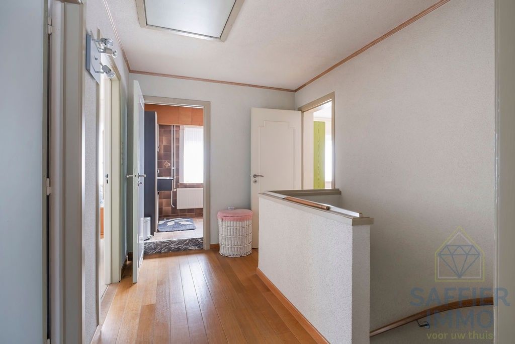 Ruime woning zonder renovatieplicht in de Seizoenswijk te Kuurne foto 24