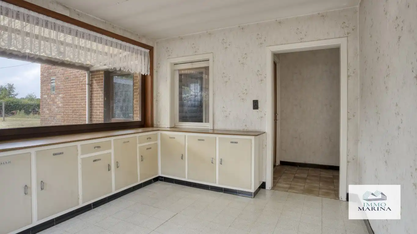 Te renoveren woning op een mooi perceel van ca. 11a 96ca in Tremelo foto 3