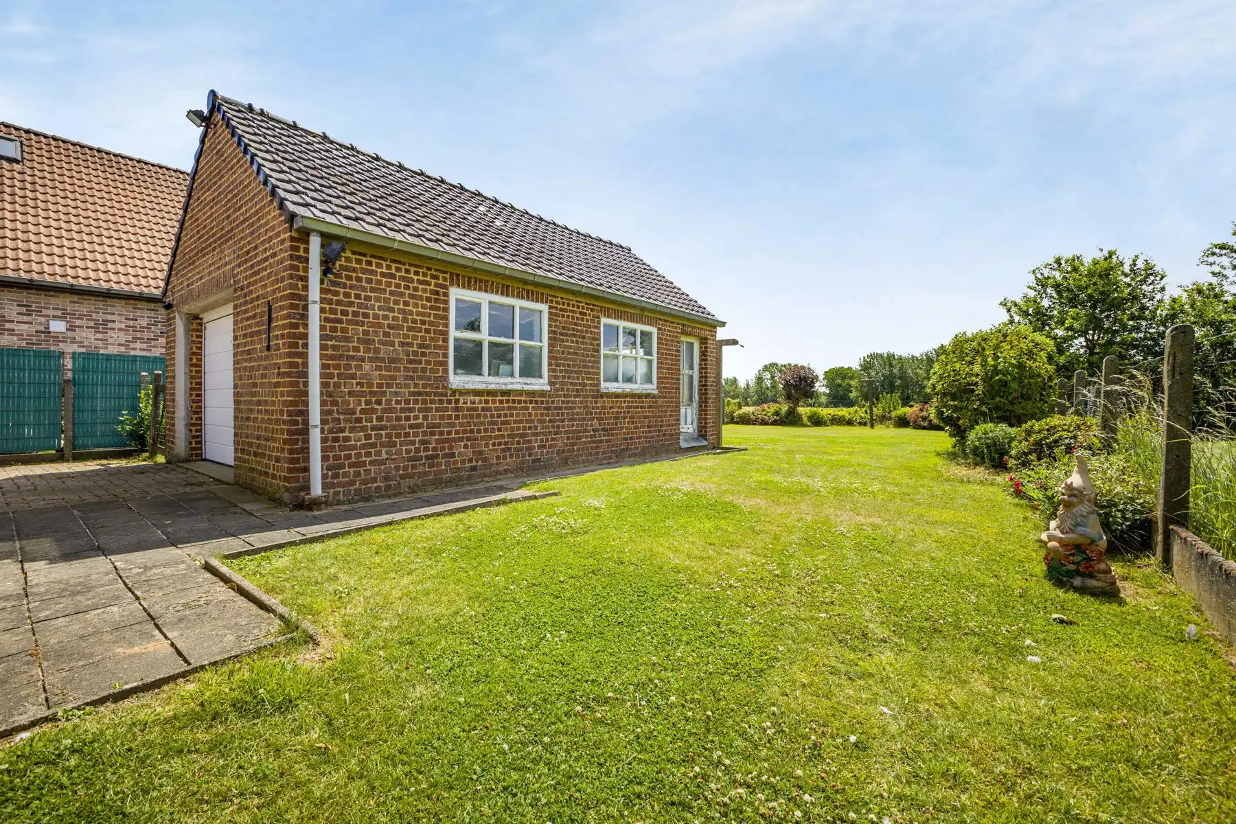 Gunstig gelegen alleenstaande woning met prachtige tuin foto 5