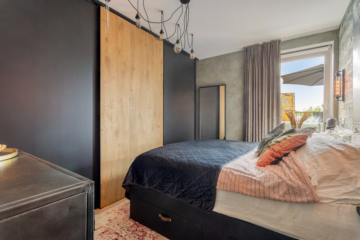 Knap ingericht éénslaapkamerappartement met groot ZW terras. foto 8
