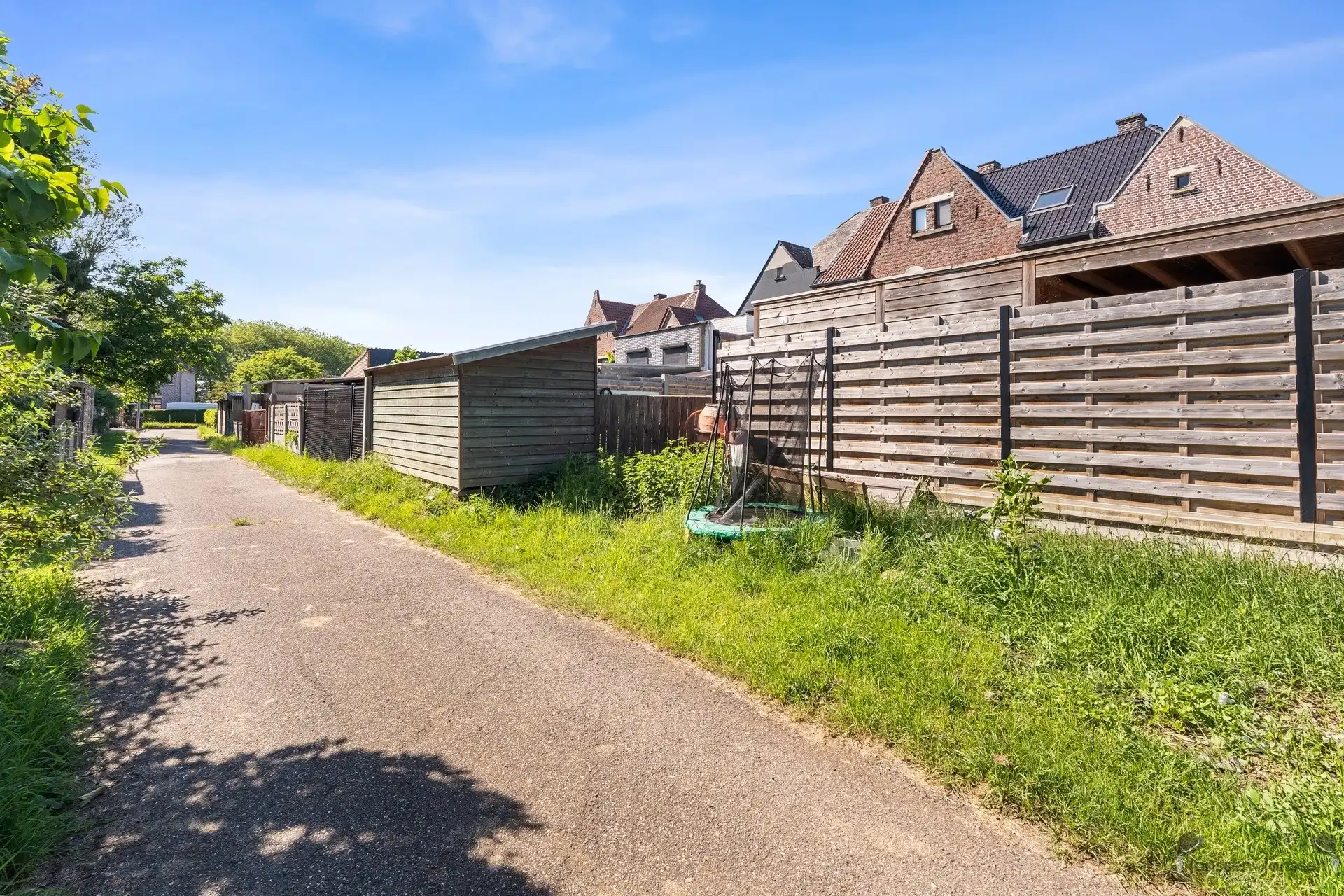 Charmante rijwoning met tuin in het groene Waterschei foto 20