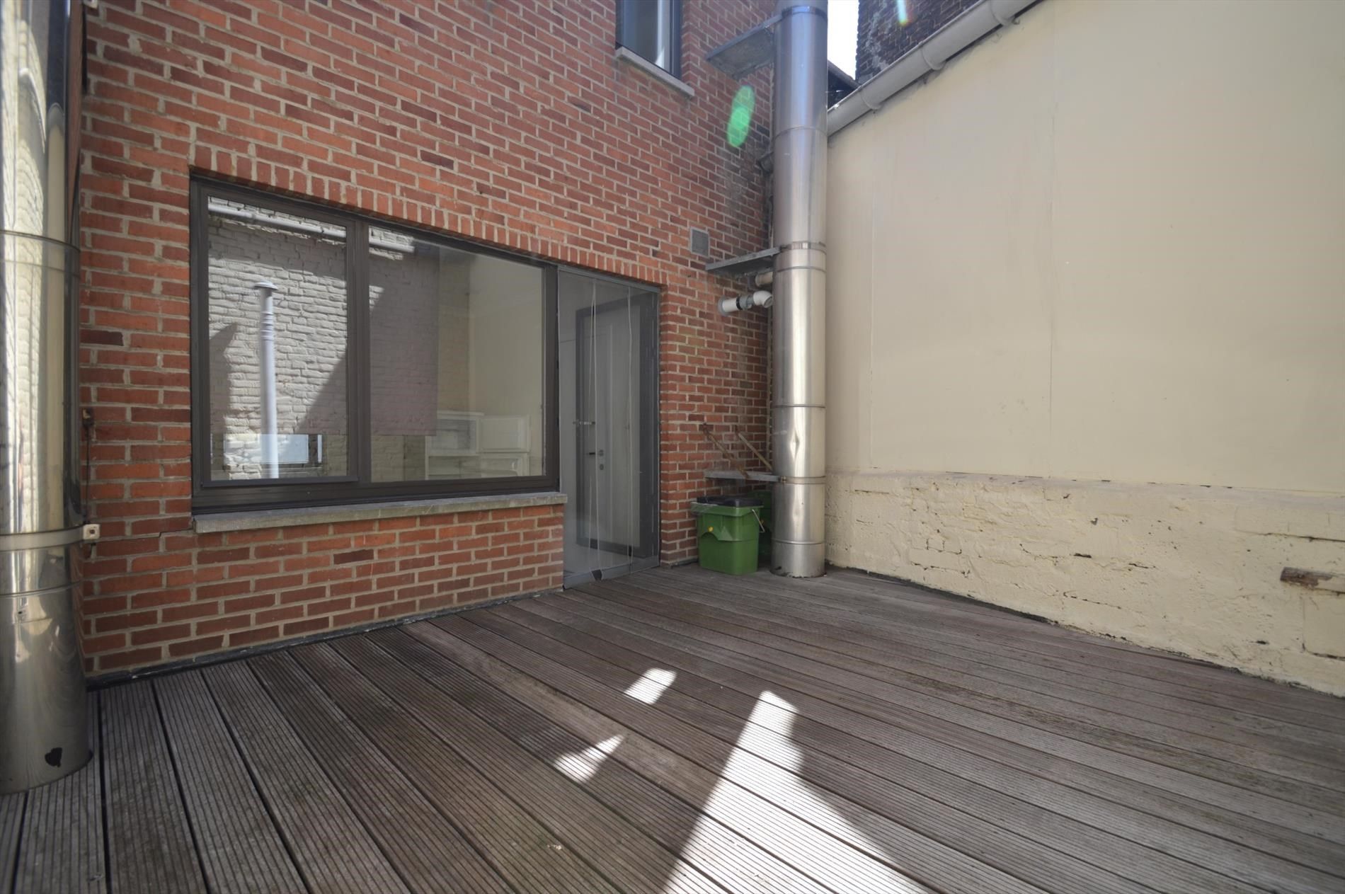 Verzorgd en betaalbaar duplexappartement met terras in het centrum van Bilzen foto 2