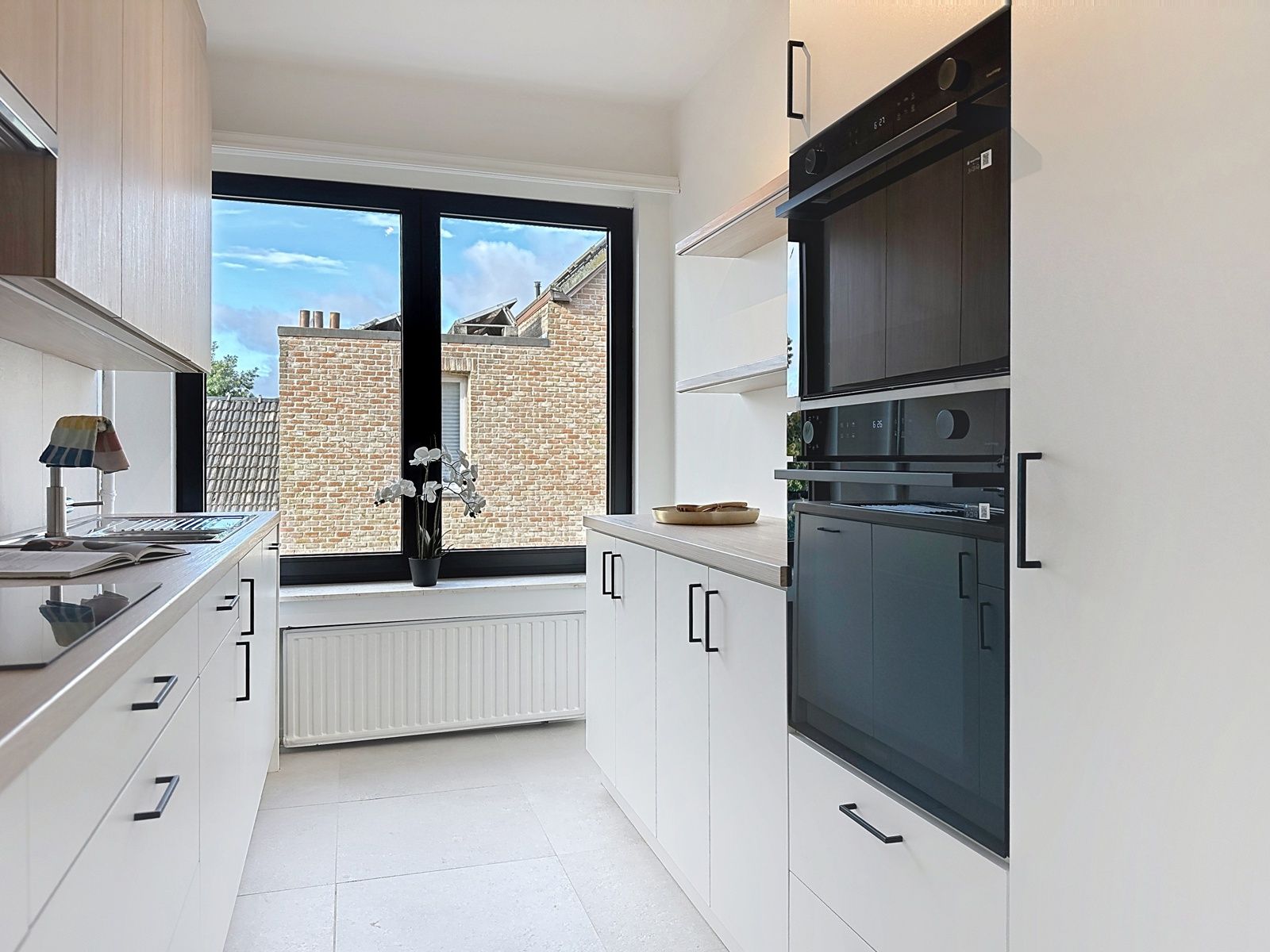 Gerenoveerd appartement in centrum Aartselaar foto 3