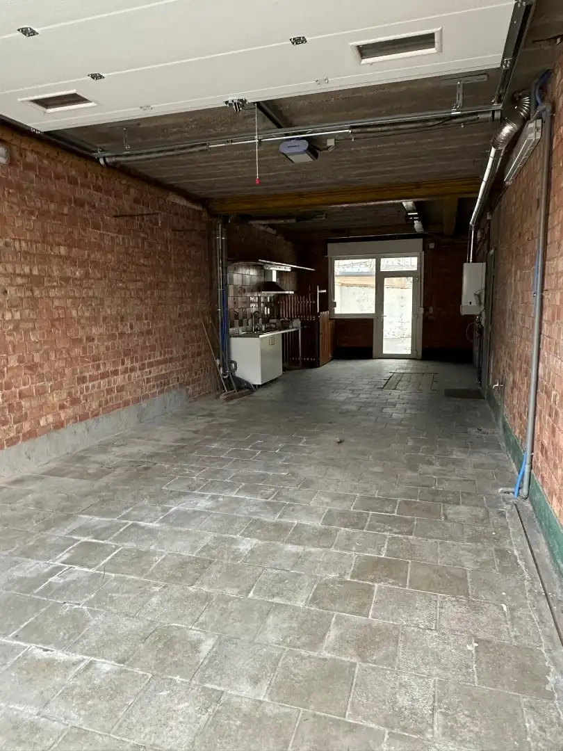 Gelijkvloersppartement met 3 slpk, dubbele garage, tuin en ruime kelder (120 m²) foto 15