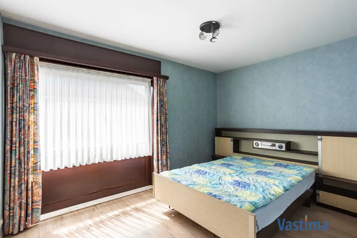 Op te frissen gezinswoning met 4 slaapkamers en zuidwestgerichte tuin foto 13