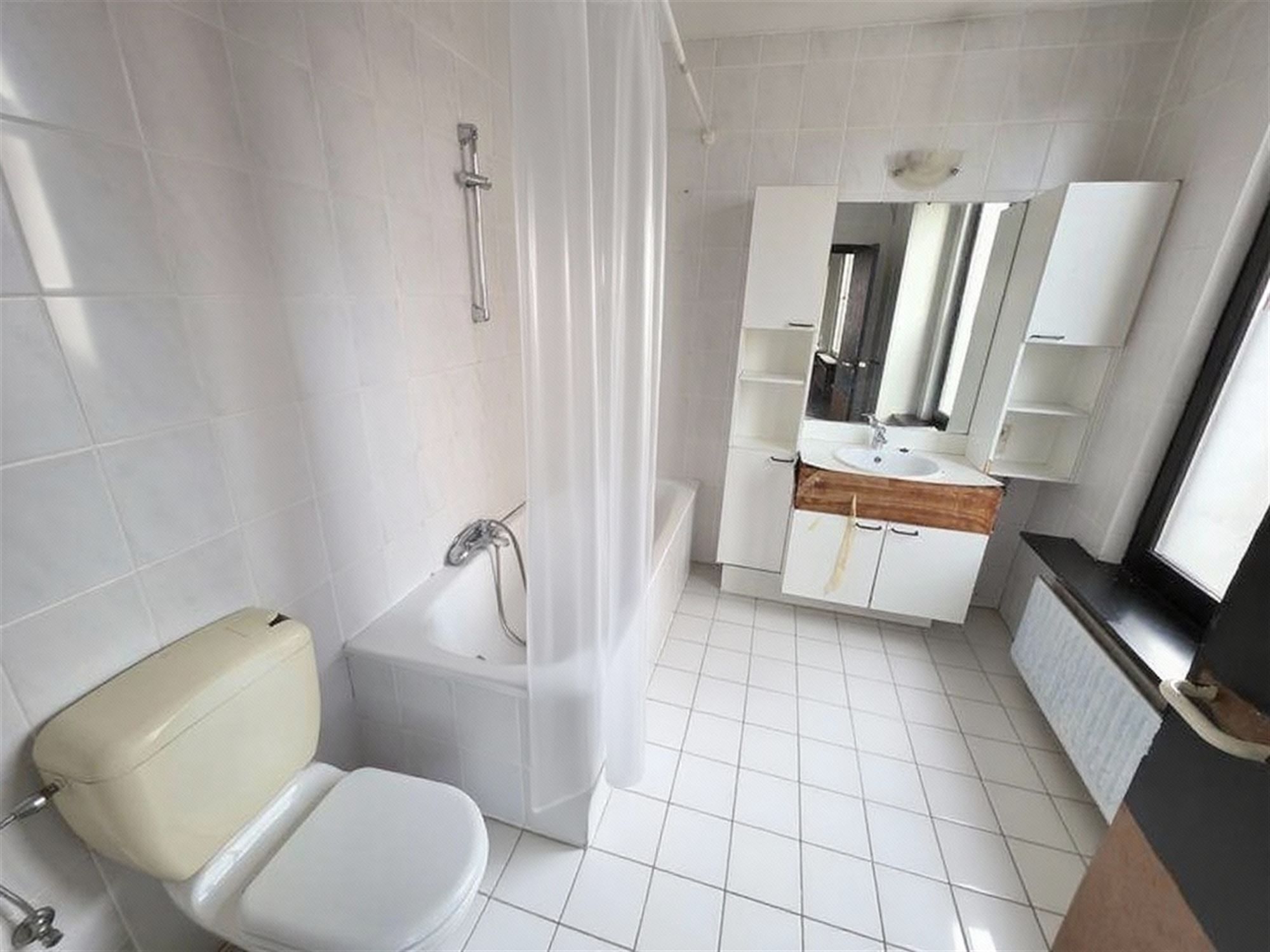 Een stadswoning met klasse én commerciële troef foto 20