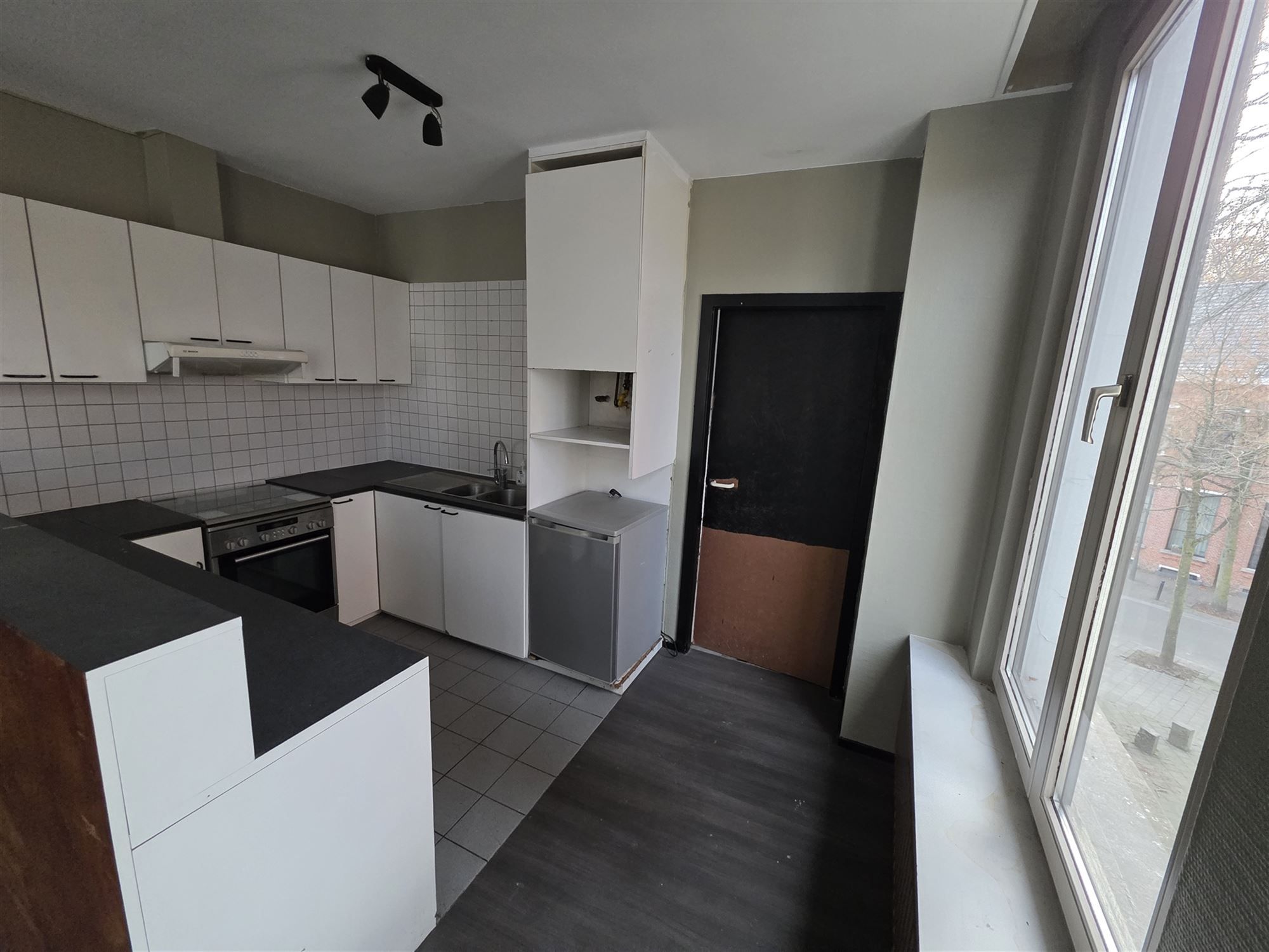 Een stadswoning met klasse én commerciële troef foto 20