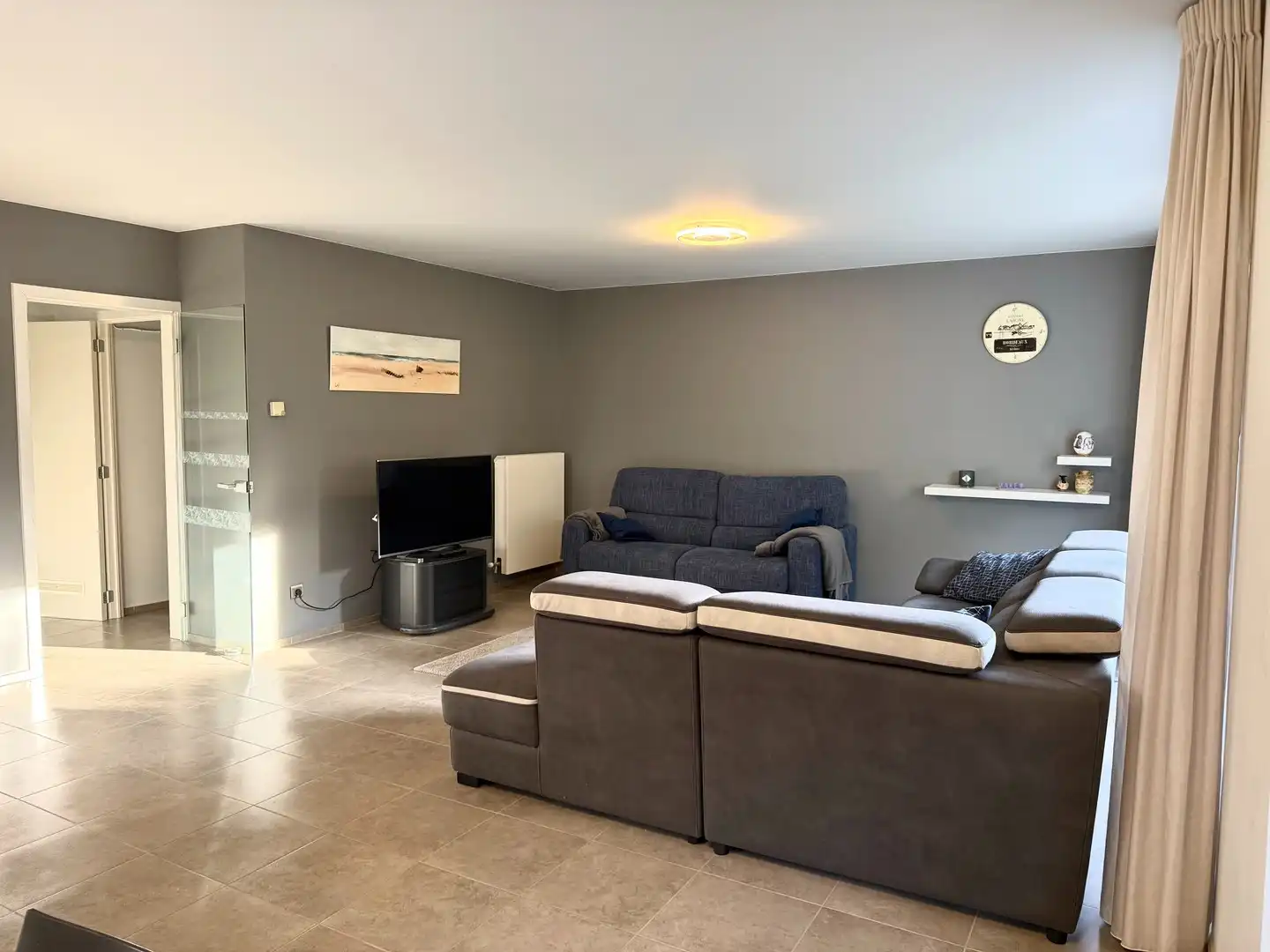 Ruim appartement met zonnig terras en tuintje. foto 7