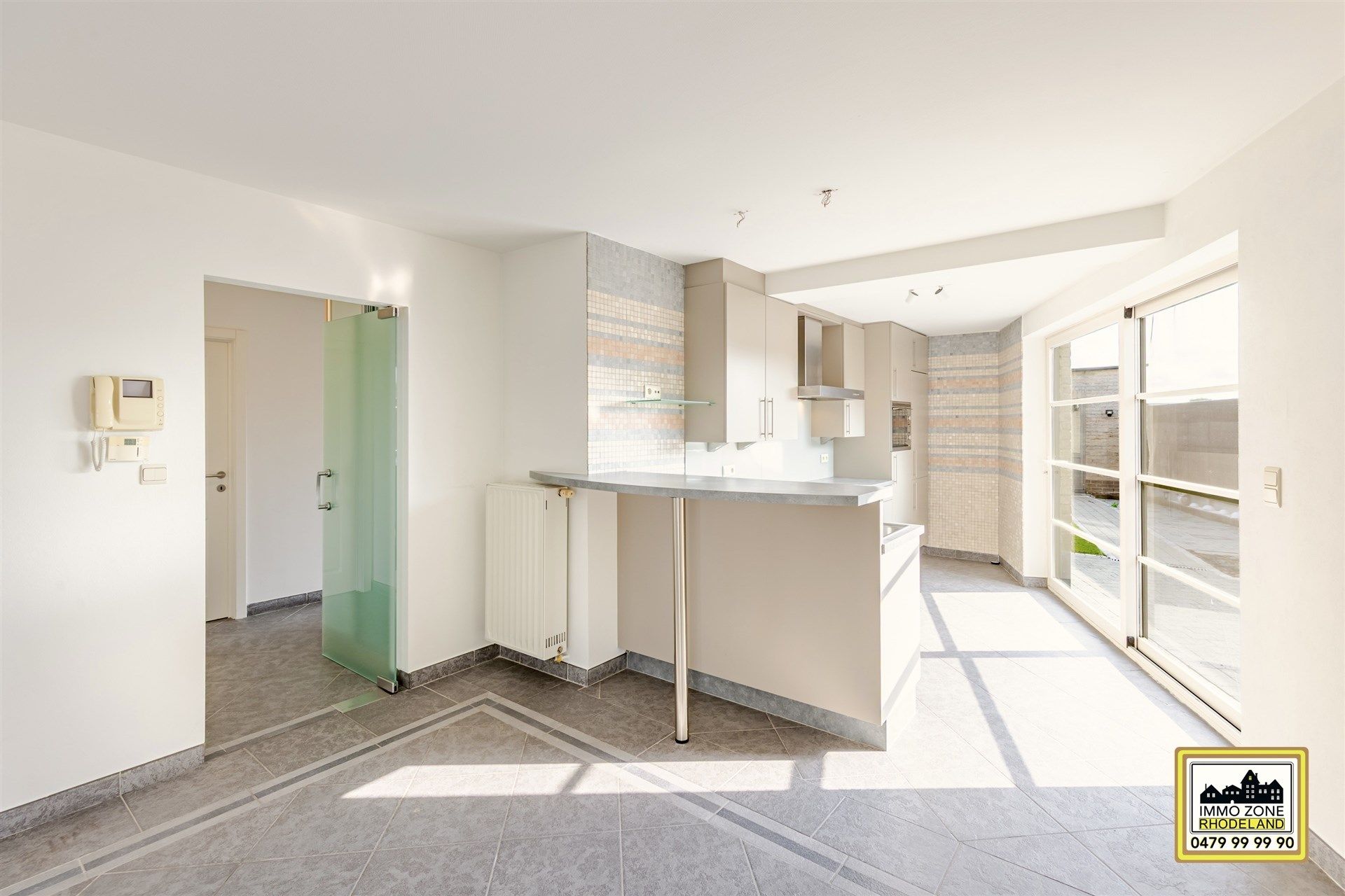 Prachtig gelijkvloers appt met 2 tot 3 slpks en leuke tuin foto 11