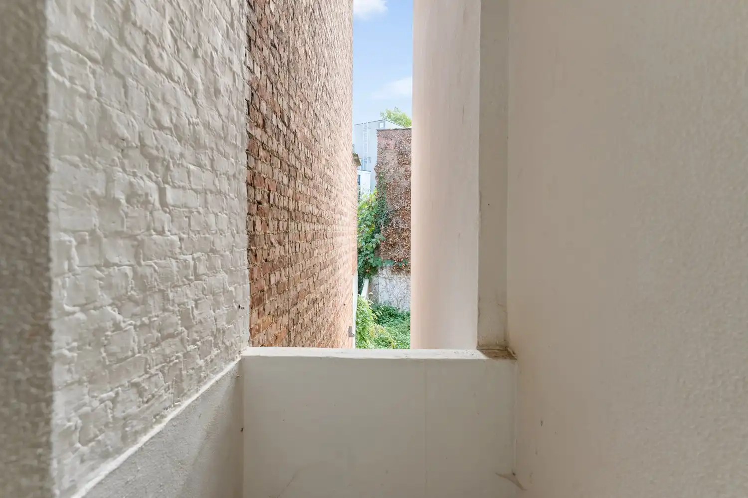 Licht en ruimte in het hart van Antwerpen – 1 slaapkamer appartement foto 9