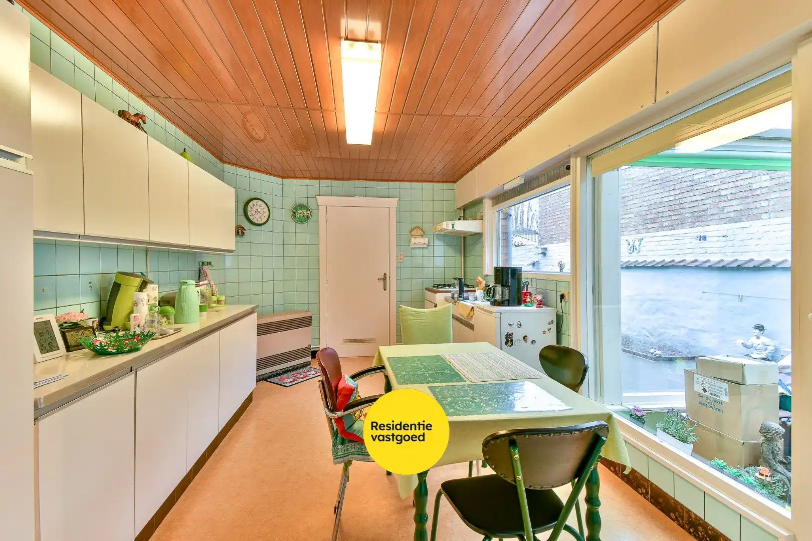 Te renoveren gezinswoning met drie slaapkamers en zongerichte tuin foto 4