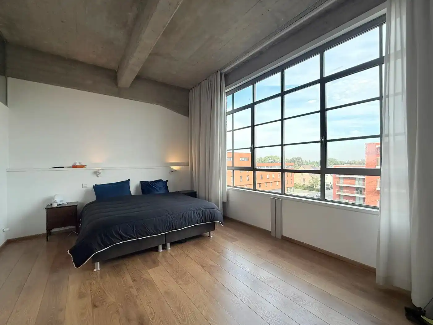 Ruime en moderne industriële loft met terras en ondergrondse parkeerplaats in Herent foto 17