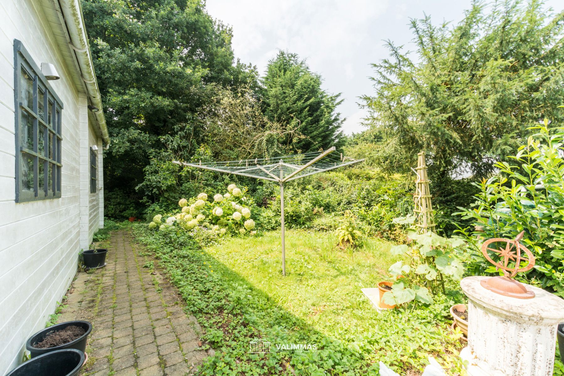 Ruime, verzorgde & instapklare woning OB met garages en tuin foto 8