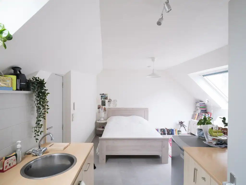 Opbrengsteigendom bestaande uit verschillende studio's en éénslaapkamer­appartementen in het centrum van Gent. foto 14