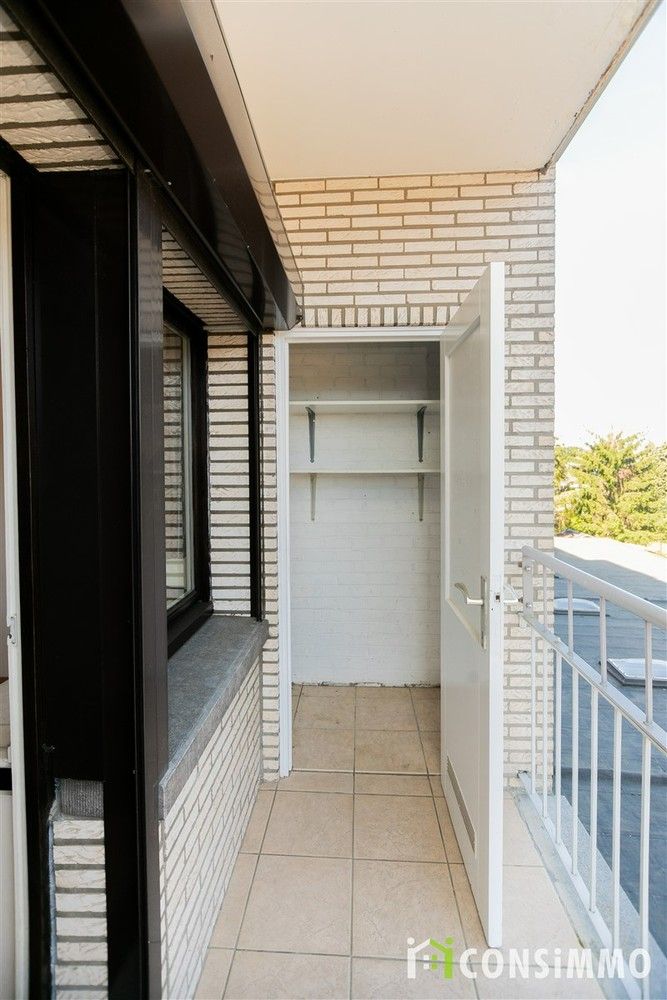 Ruim en lichtrijk appartement met 3 slaapkamers, 2 terrassen en garagebox in hartje Genk foto 21