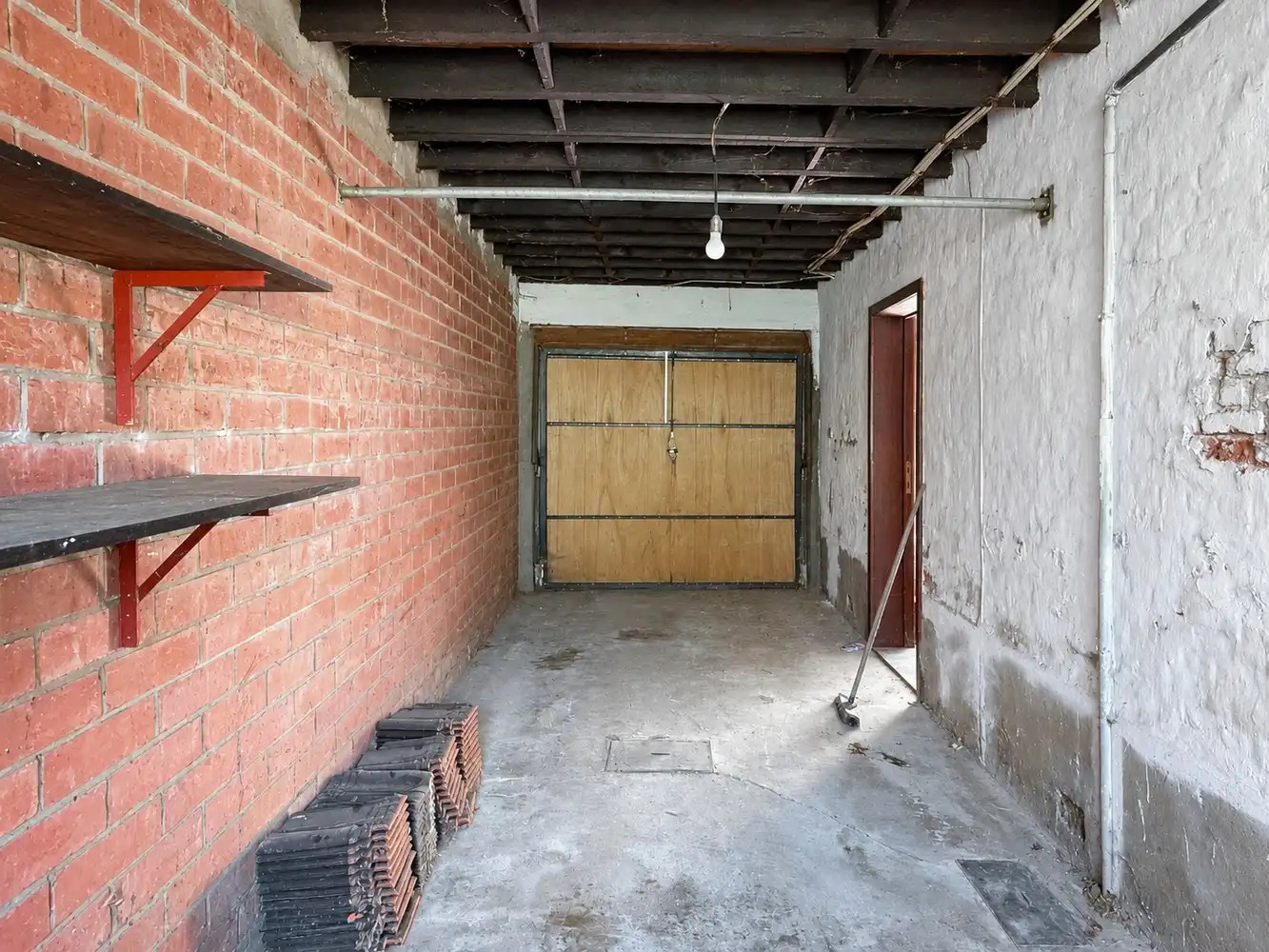 Te renoveren woning met 3 slaapkamers, garage en diepe tuin foto 8
