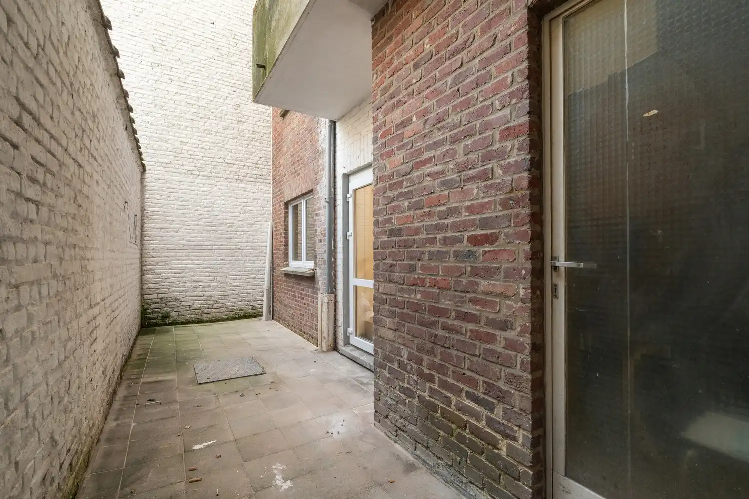 Volledig gerenoveerd gelijkvloersappartement met privatieve koer op topligging tussen het Brugmannplein en het Kasteleinsplein foto 11