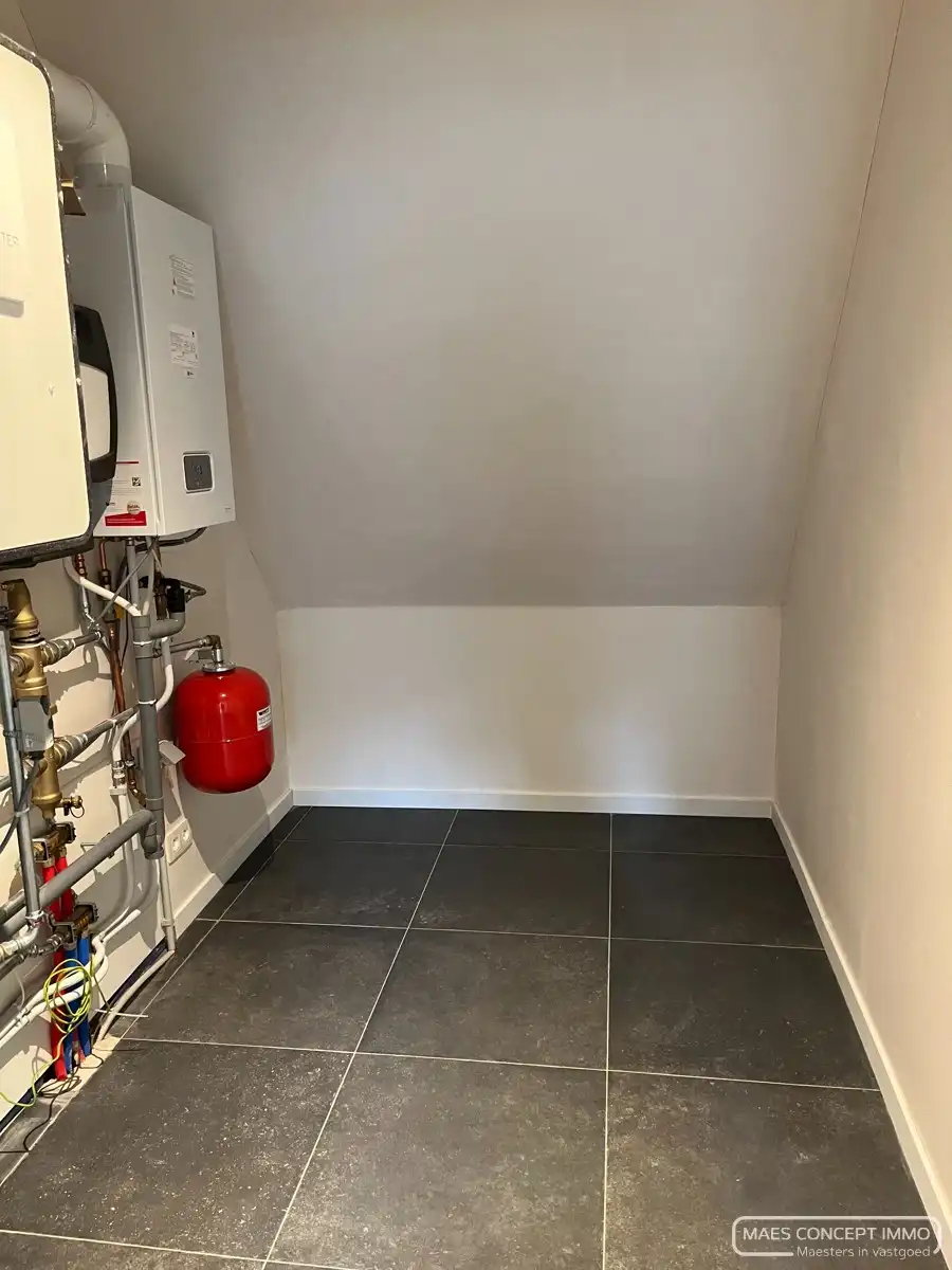 Ruime nieuwbouwwoning te huur in centrum Otegem foto 11