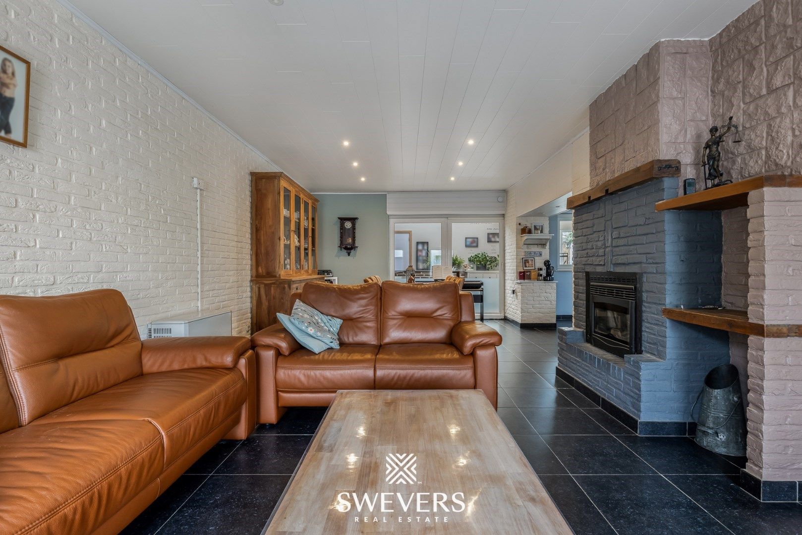 Gezellige woning met veranda, garage & zonnige tuin foto 2