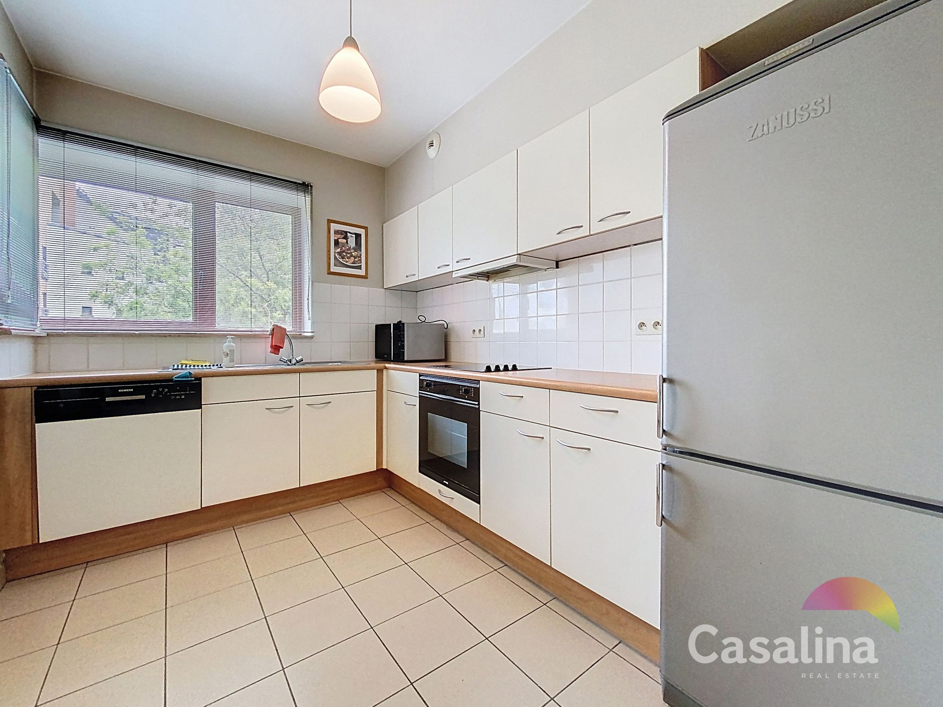 Een ruim en lichtrijk appartement van 94m² + autostaanplaats foto 4