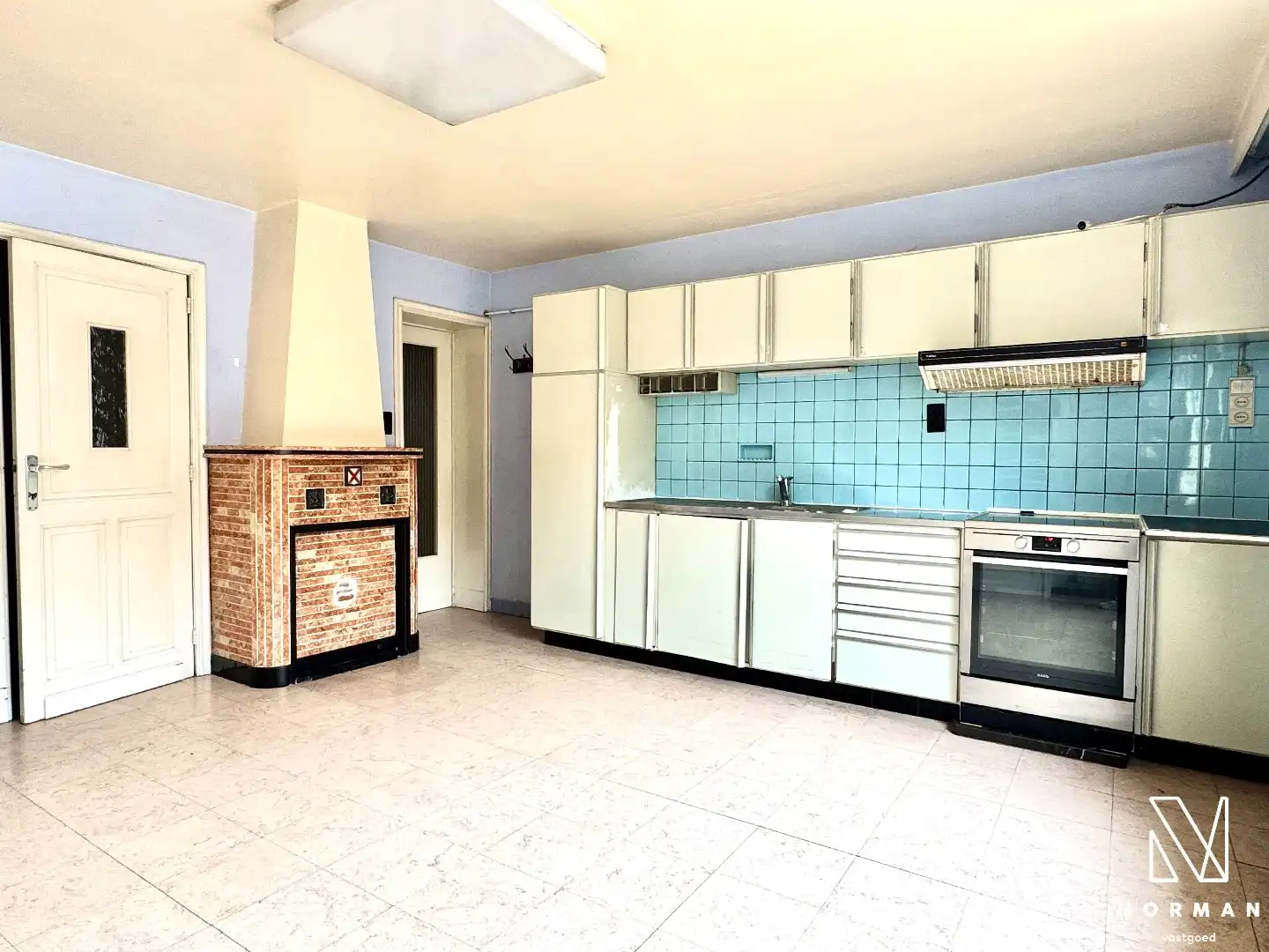 Te renoveren woning met 4 slaapkamers te koop in centrum Kuurne! foto 9