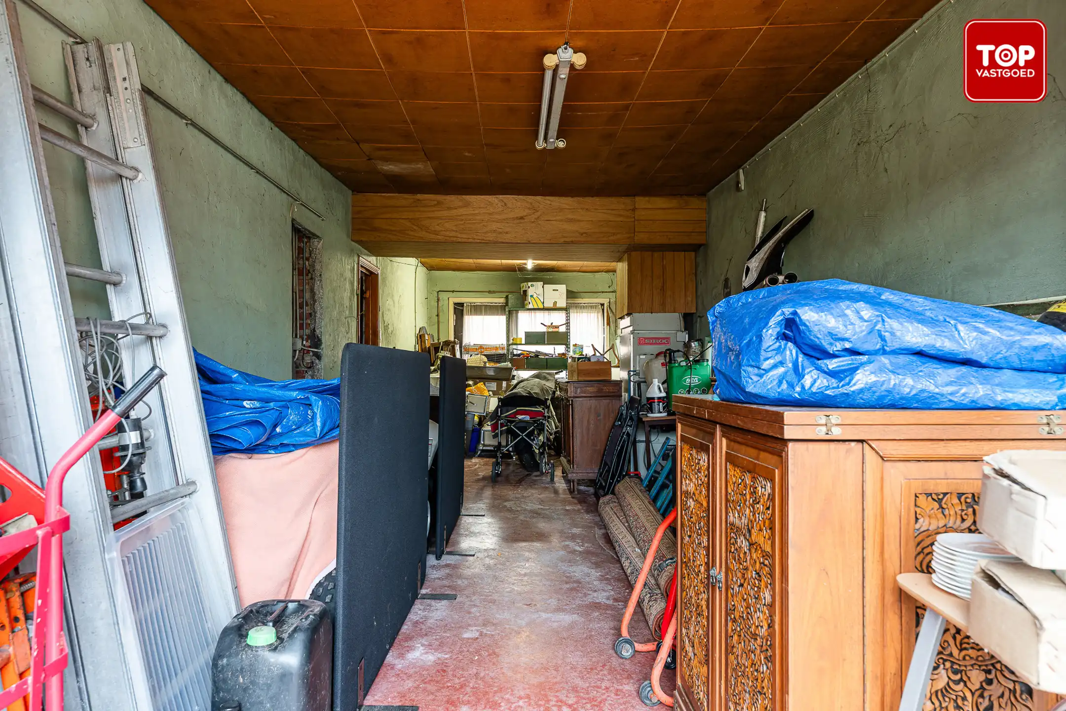 Te renoveren woning met enorme loods foto 10