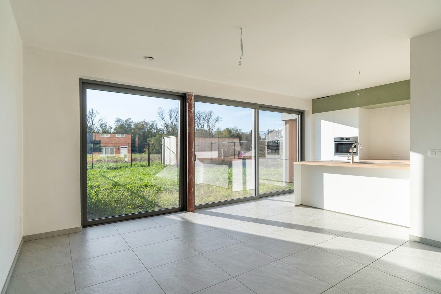 Lot 5: Halfopen bebouwing met 3 slpk., tuin en fietsberging foto 5