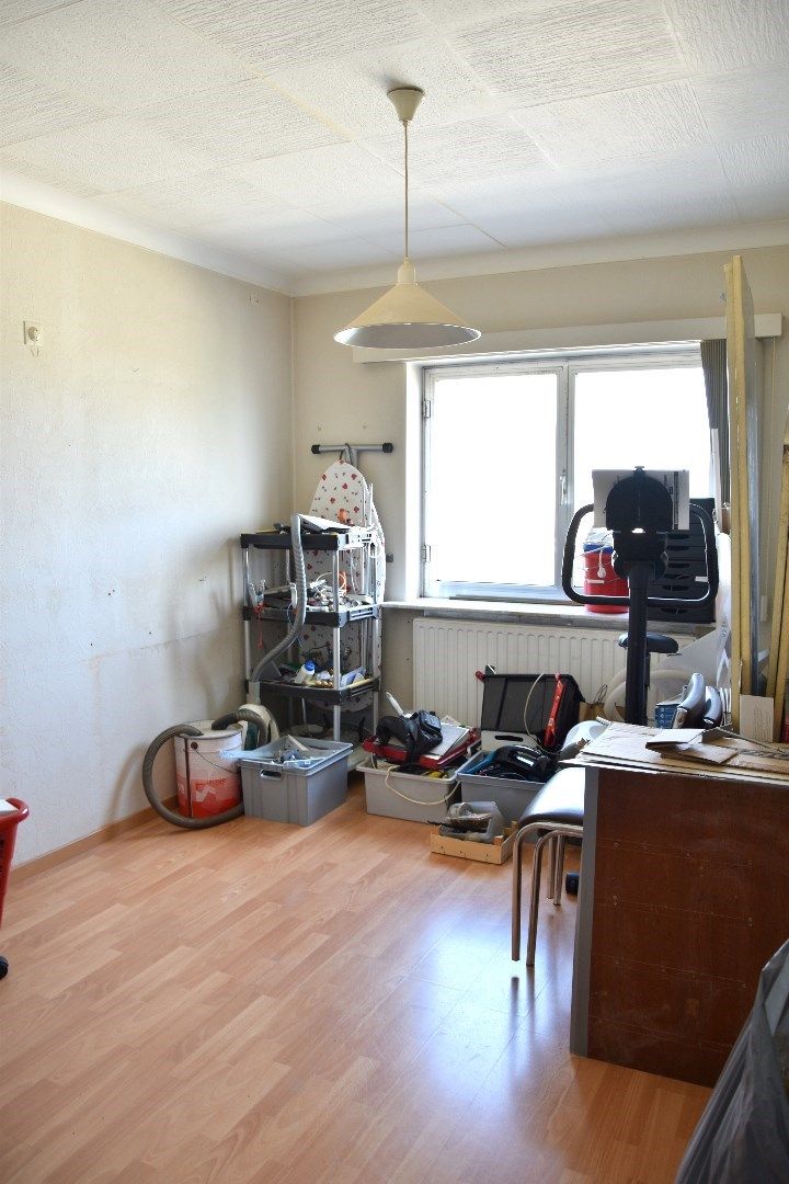 Ruim 3-slaapkamer appartement op de 4de verdieping met kelderberging en autostaanplaats te koop in Harelbeke foto 11