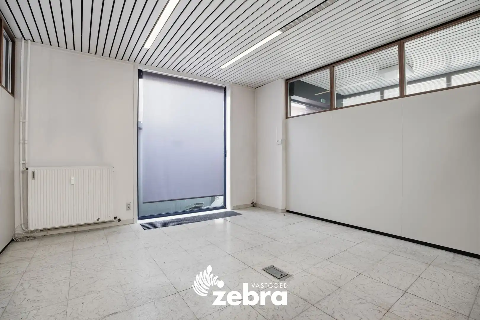 Veelzijdig handelspand met parkeerplaatsen op topligging in centrum Tielt! foto 17