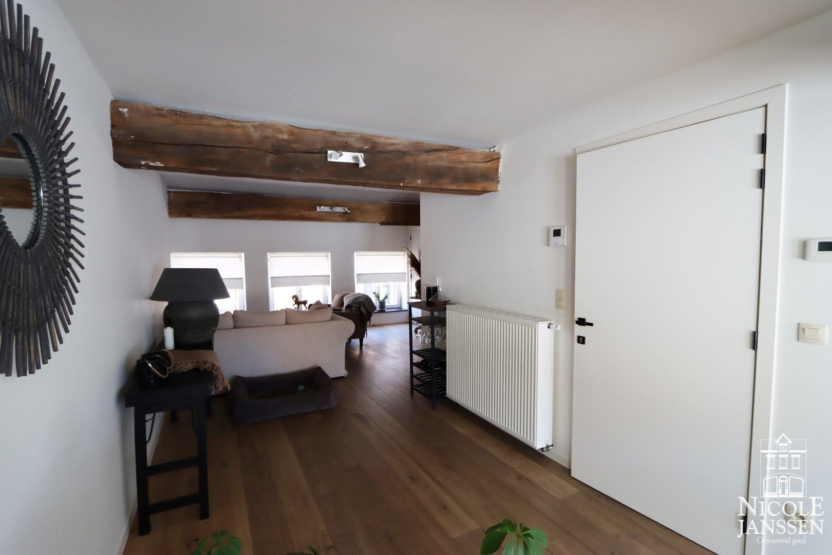 Prachtig duplex-appartement met twee slaapkamers en ruim dakterras in het hartje van Maaseik foto 2