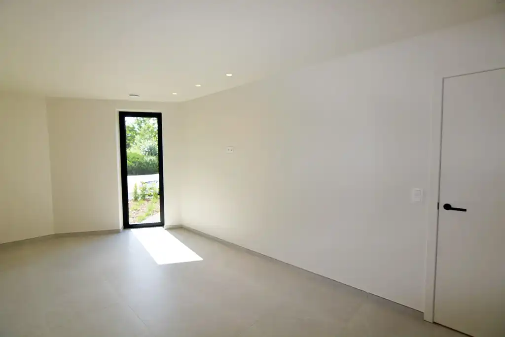 Gelijkvloers nieuwbouwappartement 124 m² met 2 slpk, tuintje en 2 autostandplaatsen. foto 13