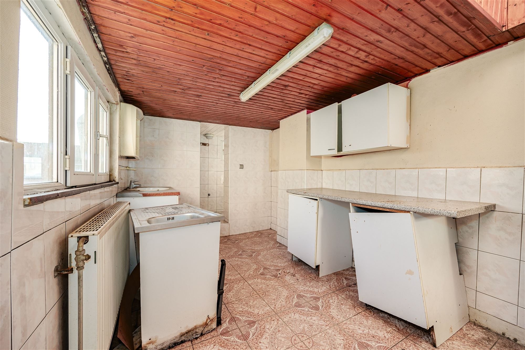 Te renoveren woning met 4 slaapkamers en koer foto 12