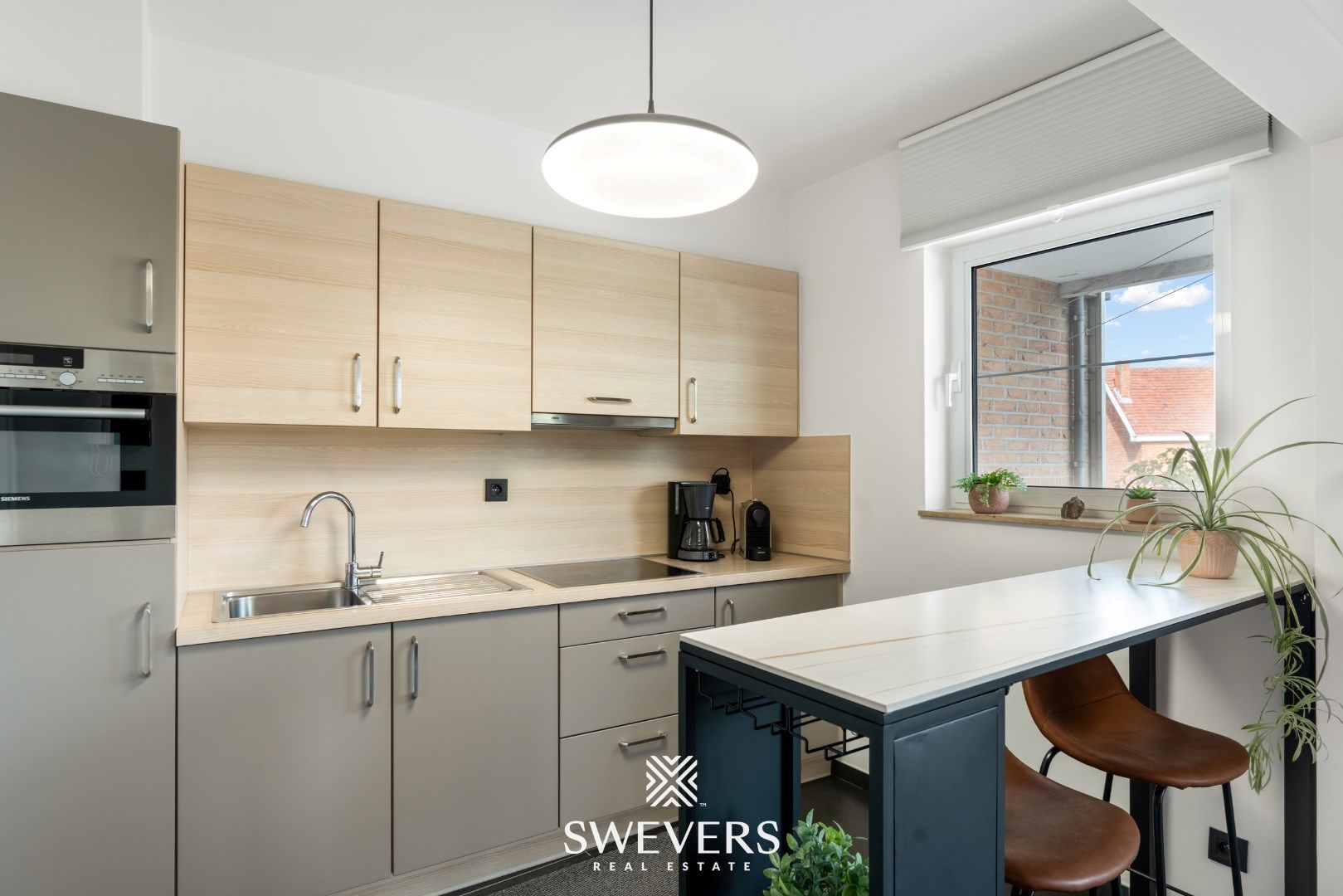 Comfortabel wonen met ruim Terras, 2 Slaapkamers, parkeerkelder & berging foto 15