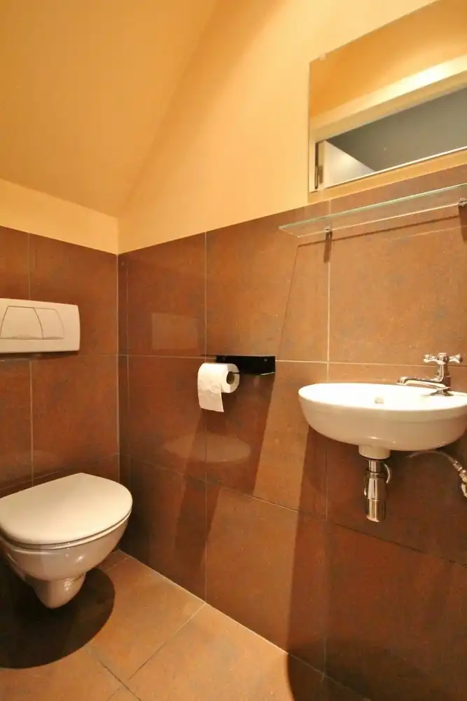 Gezellige triplex op toplocatie met 2 slaapkamers, terras en ondergrondse autostaanplaats foto 7