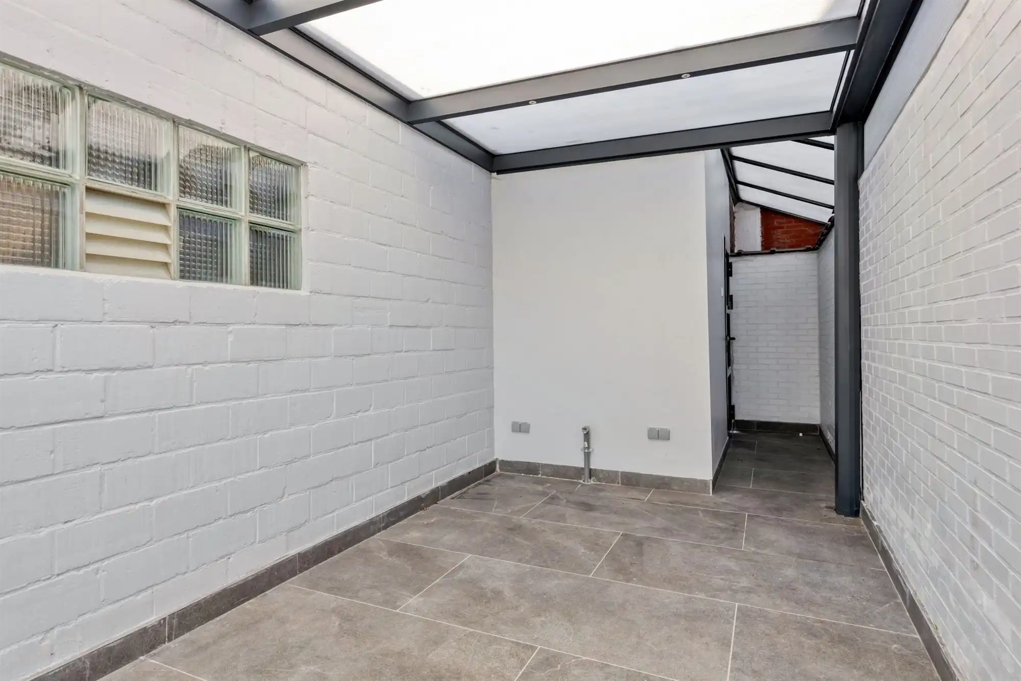 Ruime kangoeroe woning met 5 slk + 2 badk + terras in Lier foto 10