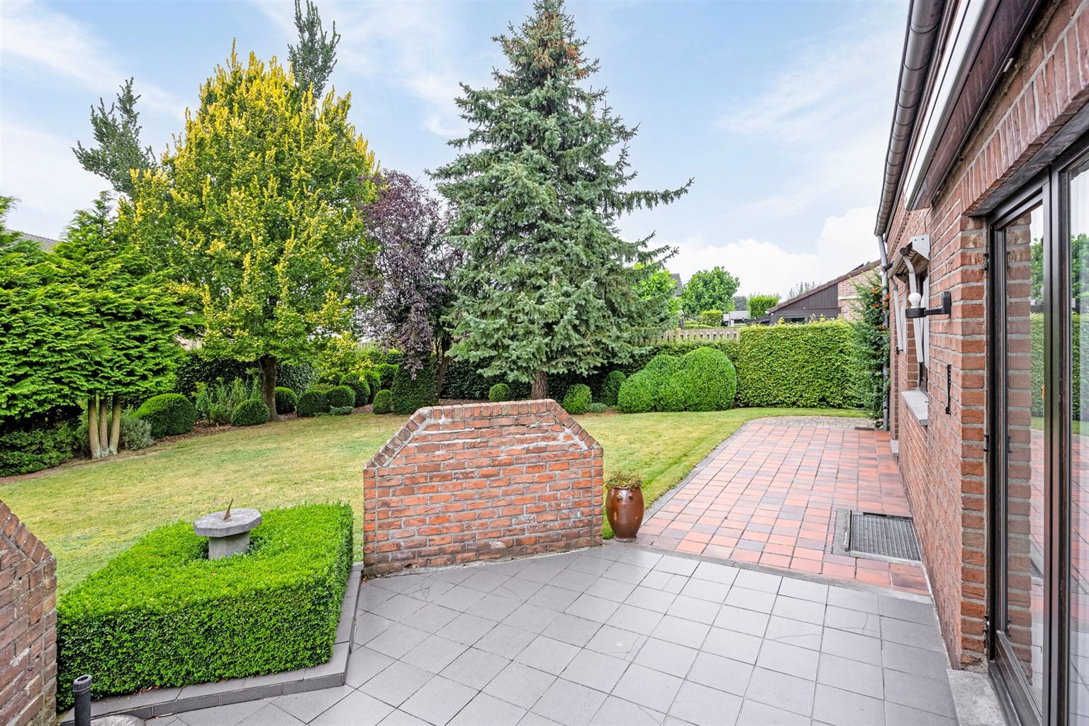 Charmante woning met 4 slaapkamers, prachtige tuin en inpandige garage, gelegen op een perceel van 8a4ca in het hart van Gruitrode. foto 30