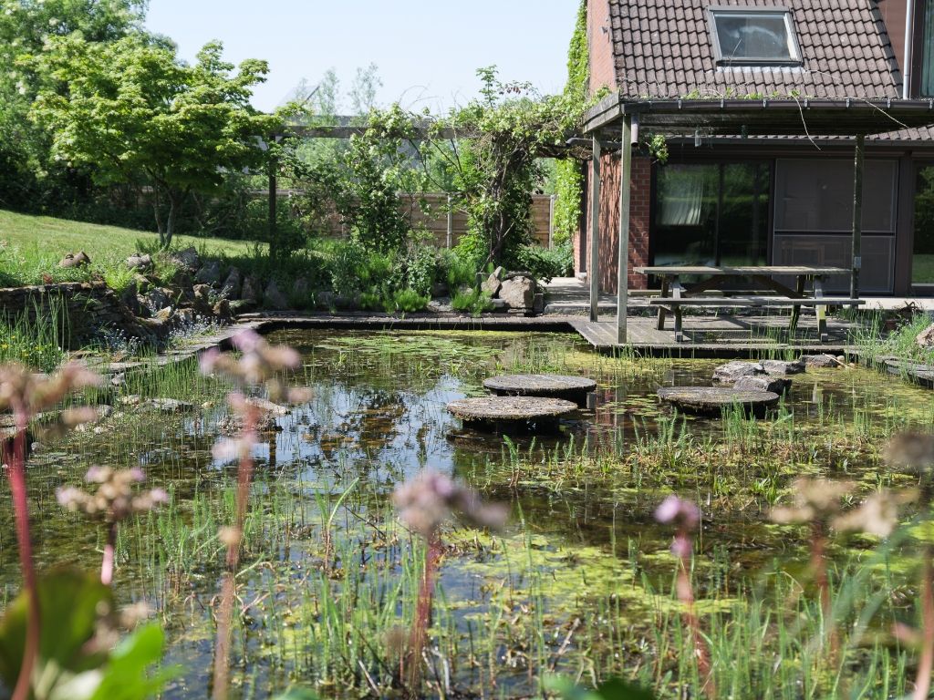 Vrijstaande woning met prachtige tuin en uitzonderlijk bouwvolume (424 m²), omringd door groen foto 8
