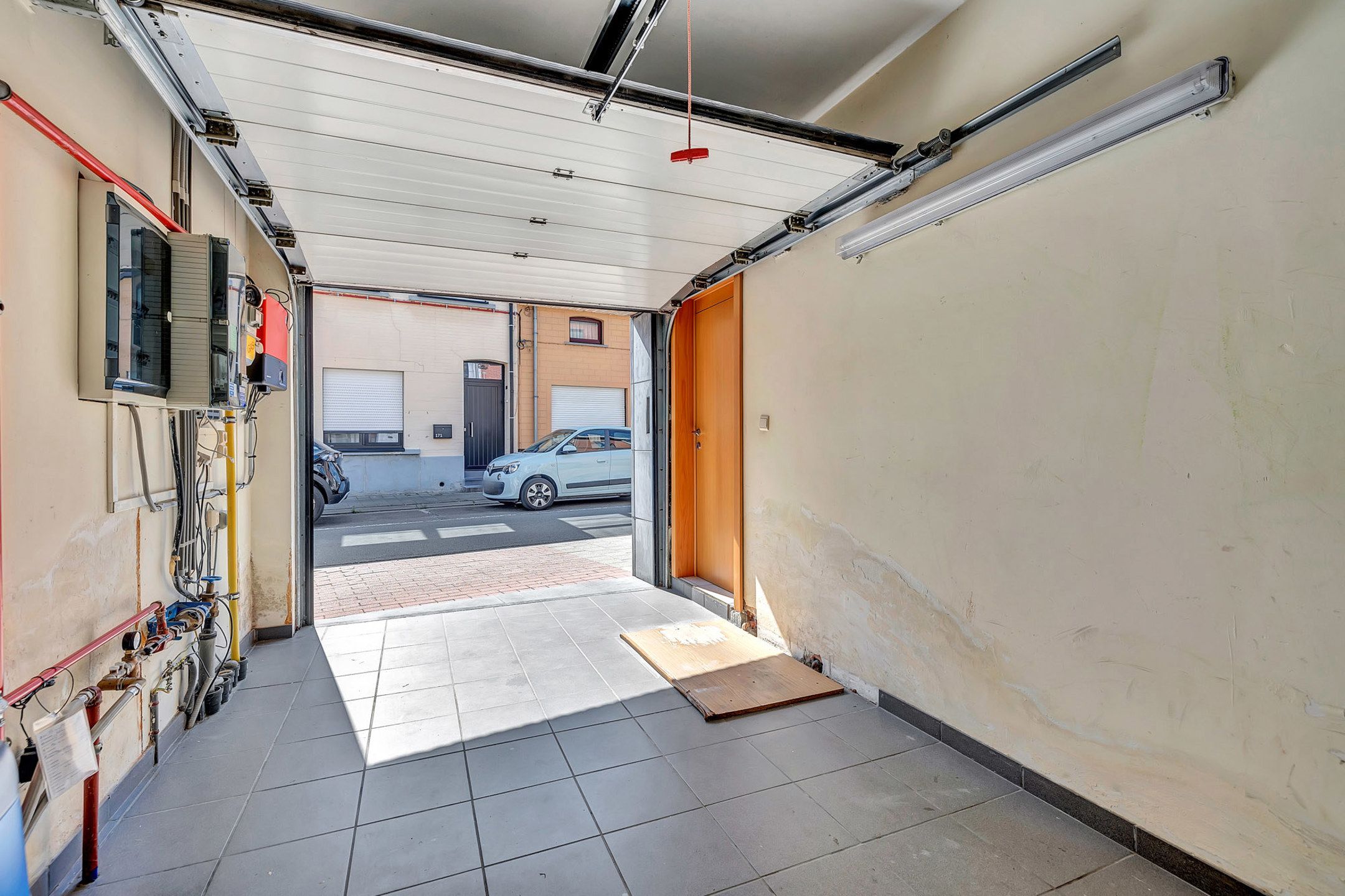 Instapklare woning met garage en tuin foto 15