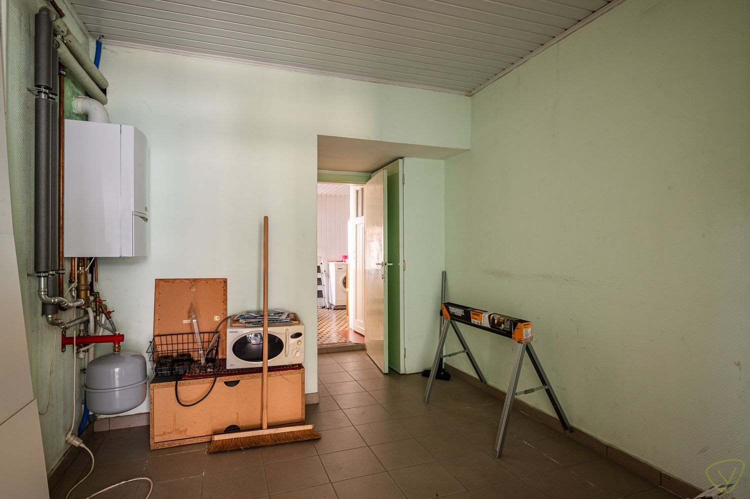 Woning met winkelruimte te koop in het centrum van Ursel foto 2