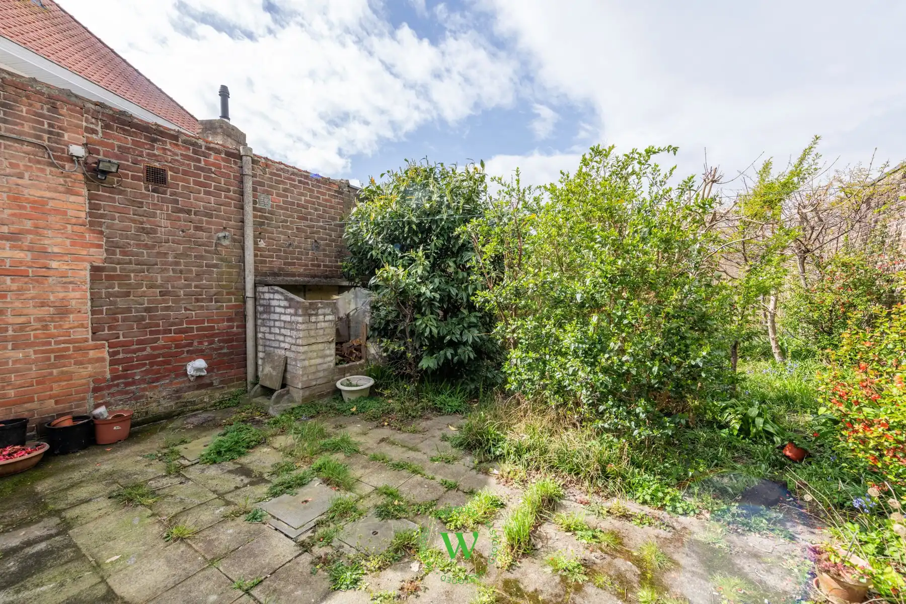 Verrassende en charmante halfopen bebouwing te Assebroek. foto 27