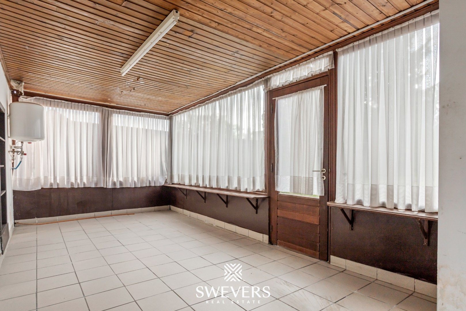 Te renoveren woning met veel potentieel op toplocatie te Diepenbeek foto 10