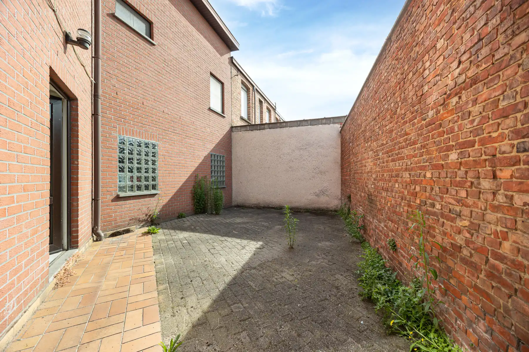 Lichtrijk gelijkvloers hoekappartement in Niel foto 12