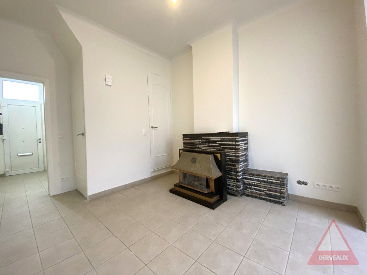 Heule – Woning met tuin op centrale ligging foto 4