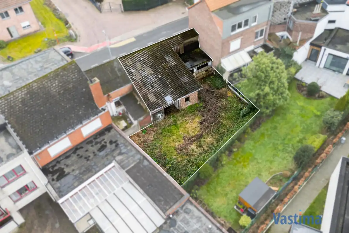 Unieke grond in het hart van Merchtem foto 6