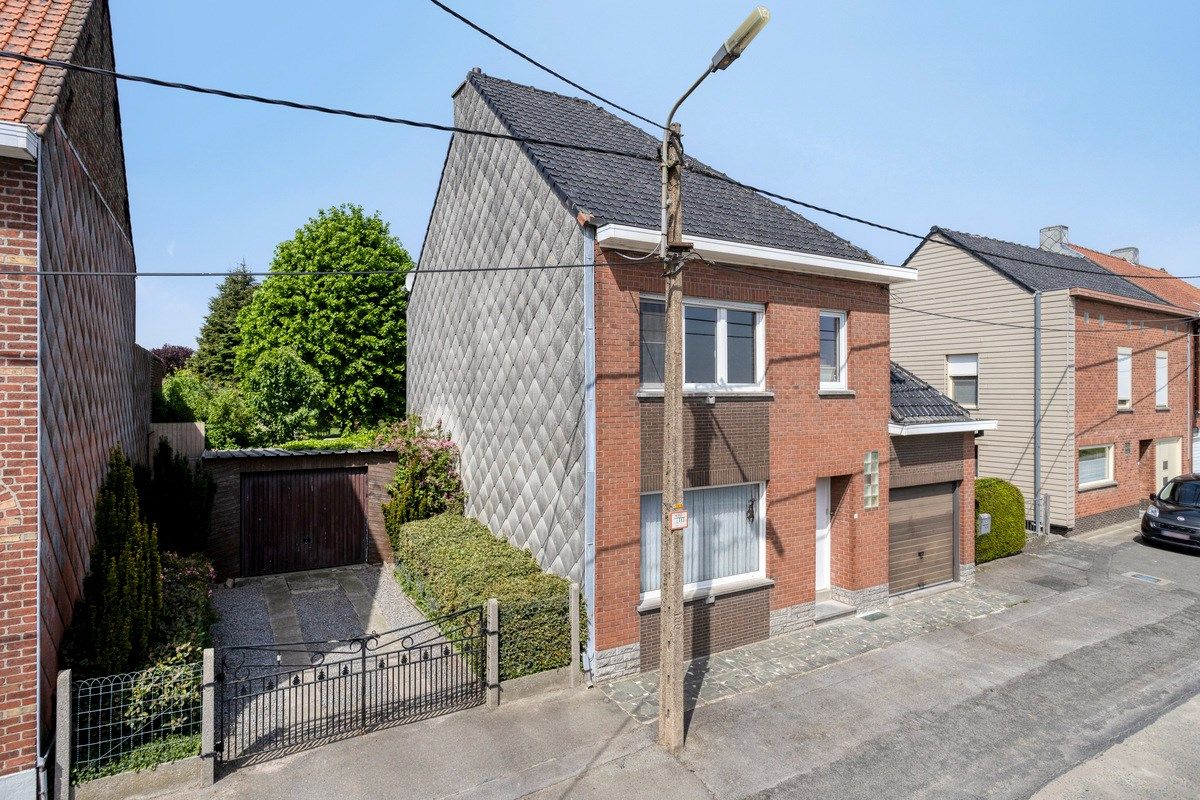 Hoofdfoto van de publicatie: Te renoveren woning met naastliggend bouwperceel!