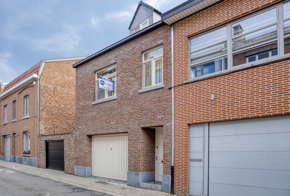Charmante, volledige instapklare woning met twee slaapkamers en een inpandige garage in hartje Tongeren foto 26